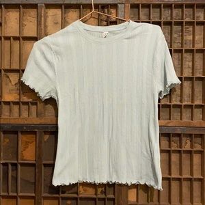 Mid length patterned tshirt with ruffle hem